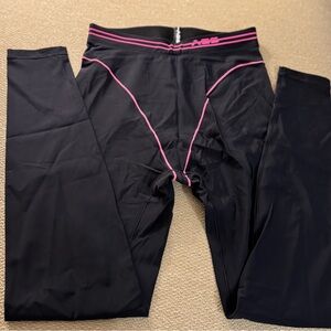 Adam Selman Sport French Cut Leggings 
Black and Pink leggings